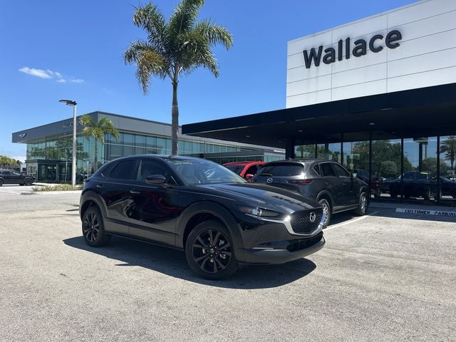 2026 Mazda Mazda CX-30 2.5 S Select Sport AWD in Jet Black Mica — front three-quarter view