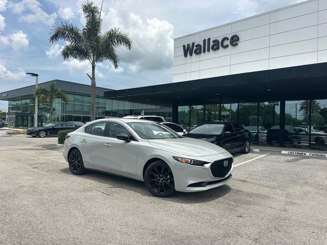 2026 Mazda Mazda3 Sedan 2.5 S Select Sport in Ceramic Metallic — front three-quarter view