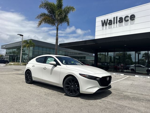 2026 Mazda Mazda3 Hatchback 2.5 S Premium in Snowflake White Pearl — front three-quarter view