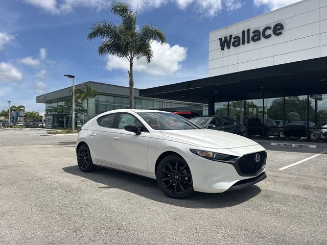 2026 Mazda Mazda3 Hatchback 2.5 S Carbon Edition AWD in Snowflake White Pearl — front three-quarter view