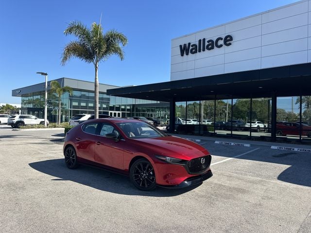 2026 Mazda Mazda3 Hatchback 2.5 Turbo Premium Plus AWD in Soul Red Crystal Metallic — front three-quarter view