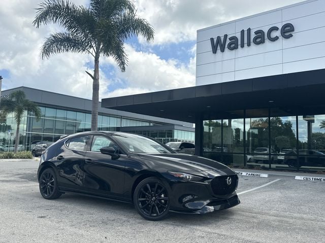 2026 Mazda Mazda3 Hatchback 2.5 Turbo Premium Plus AWD in Jet Black Mica — front three-quarter view