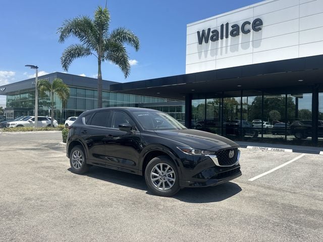 2025 Mazda Mazda CX-5 2.5 S Select AWD in Jet Black Mica — front three-quarter view